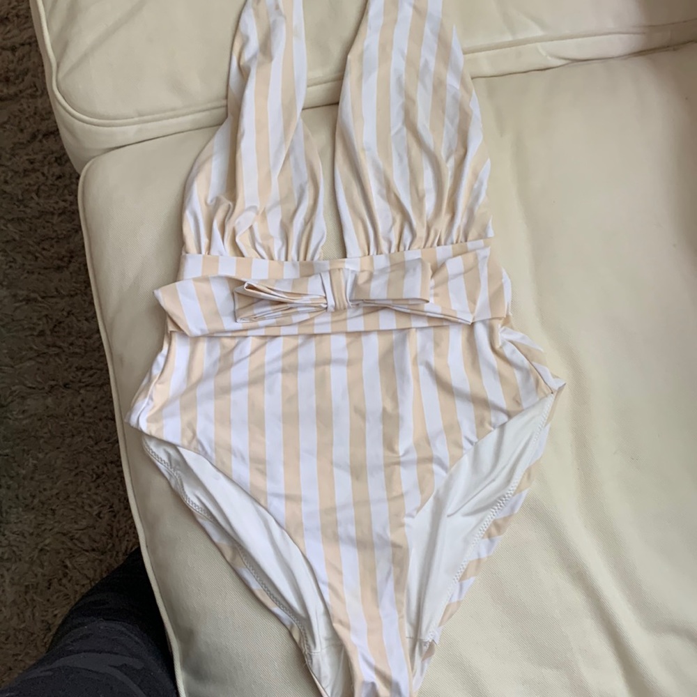 We wore what Brooklyn plunge one piece suit